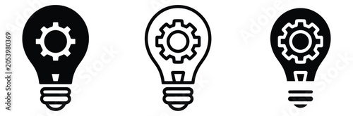 Foto Three black and white light bulb icons with gear inside for business and technol