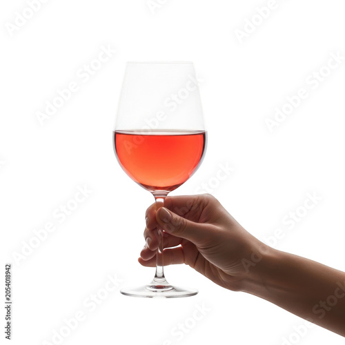 Hand holding glass of rose wine against transparent background for design projects.