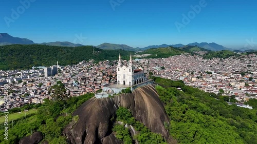 Aerial View of Basilica Sanctuary of Our Lady of Penha Built on a Rock With Views of the Neighborhood Behind in Rio de Janeiro City
