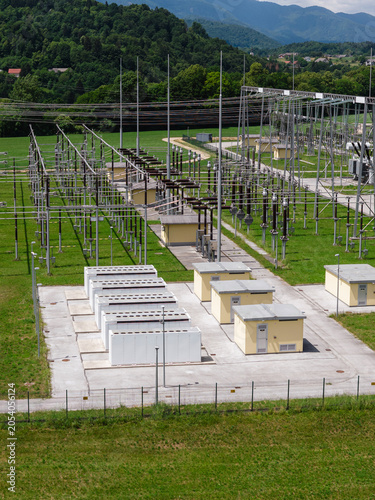 Battery energy storage system operates near electrical substation and supports renewable energy integration and power distribution.