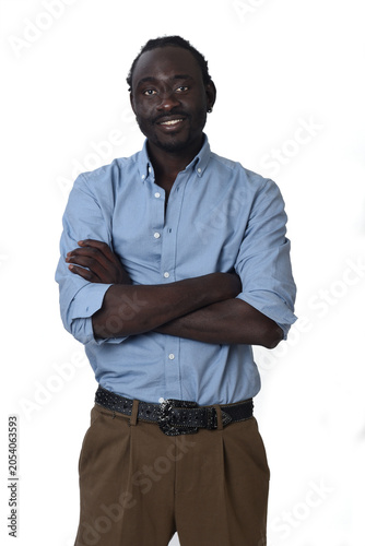 front view of  waist up portrait of a african man arms crossed