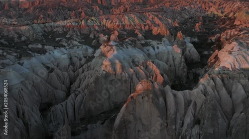 Aerial view of fairy chimneys and volcanic rock formations near Göreme in Cappadocia. One of Turkey’s most iconic and spectacular landscapes.
