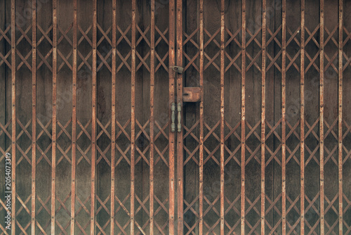 Cuadro en lienzo Full frame texture background of an old vintage collapsible iron gate