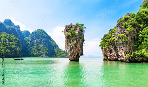 Iconic Limestone Pillar at James Bond Island in Phang Nga bay, near Phuket in Thailand. Legendary vertical karst formation rising from emerald waters in Phang Nga Bay