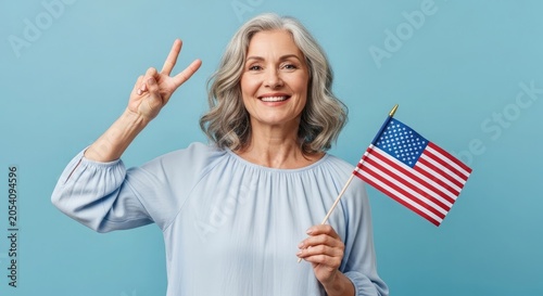Happy 4th of july independence day usa celebration with smiling senior woman holding american flag