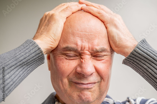 Schilderij op canvas Close up senior man 60-65 years old with hand, expressing stress, headache, or f