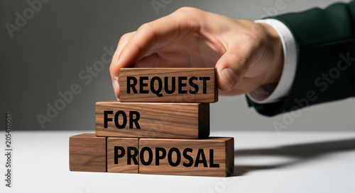 Businessman Hand Stacking Request For Proposal Wooden Blocks