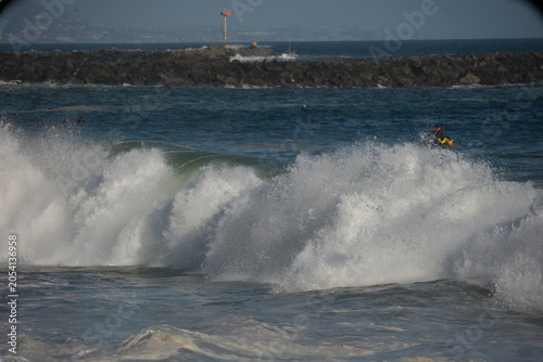 Giant swell barrels breaking at the wedge