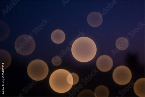 Abstract Bokeh Lights Against a Dark Background