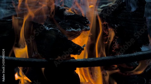 The orange and yellow flames dance as the logs burn in the metal fire pit.  Wood fire in the morning or evening are soothing in Windsor in Upstate NY.