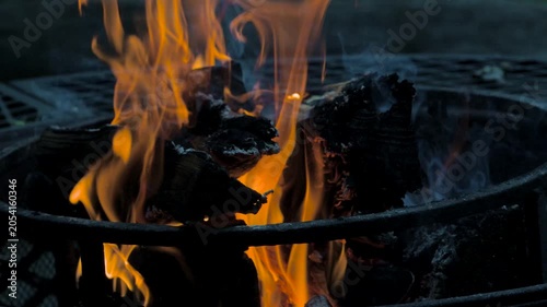 The orange and yellow flames dance as the logs burn in the metal fire pit.  Wood fire in the morning or evening are soothing in Windsor in Upstate NY.
