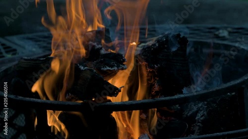 The orange and yellow flames dance as the logs burn in the metal fire pit.  Wood fire in the morning or evening are soothing in Windsor in Upstate NY.