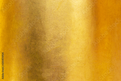 Gold metal background or texture  and gradients shadow horizontal shape, copy space (High resolution), real photo