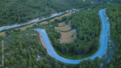 Hairpin Mountain Road in Mediterranean Forest Landscape