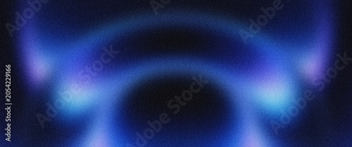 Foto Abstract background showing circular blue light waves on dark grainy texture creating ethereal glowing effect for modern artistic creative digital graphic design