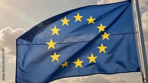 Flag of the european union waving in the wind against a cloudy sky