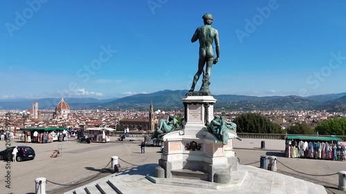 Drone perspective of David statue replica overlooking Florence from Piazzale Michelangelo
