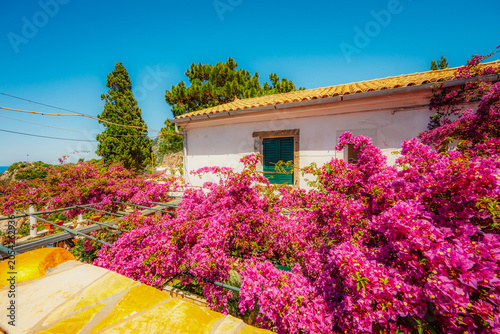Holy Monastery of the Virgin Mary at Paleokastritsa in Corfu. Palaiokastritsa bay on the Greek island of Corfu