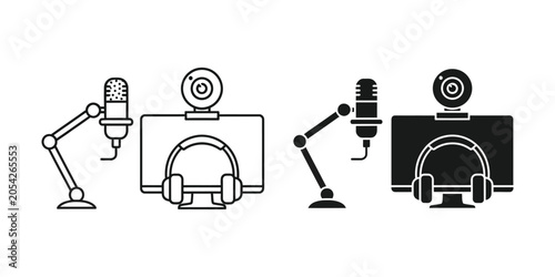 Streamer setup with microphone webcam and headphones on monitor in studio lighting with copy space