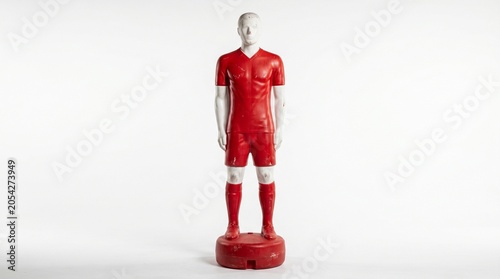 Soccer Training Dummy: A red soccer training dummy, designed to simulate a player for practice, stands on a circular base, ready for drills and skill improvement.
