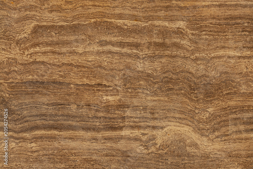 Obraz na plátně Brown stone surface shows layers and textures with natural patterns formed over