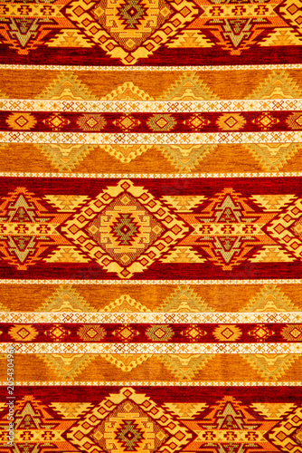 Colorful geometric patterned textile fabric with intricate designs