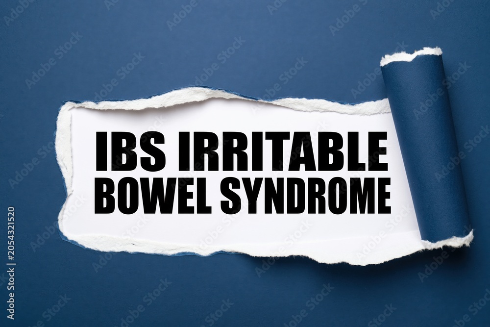 Obraz premium ibs irritable bowel syndrome written under a torn blue paper