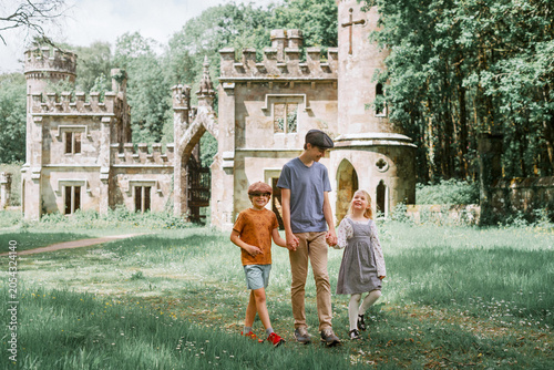 Family Exploring Historic Ballysaggartmore Towers in County Waterford, Ireland