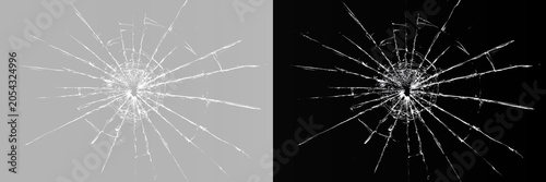 Obraz na plátně Broken glass texture with bullet hole and radial cracks on transparent and black