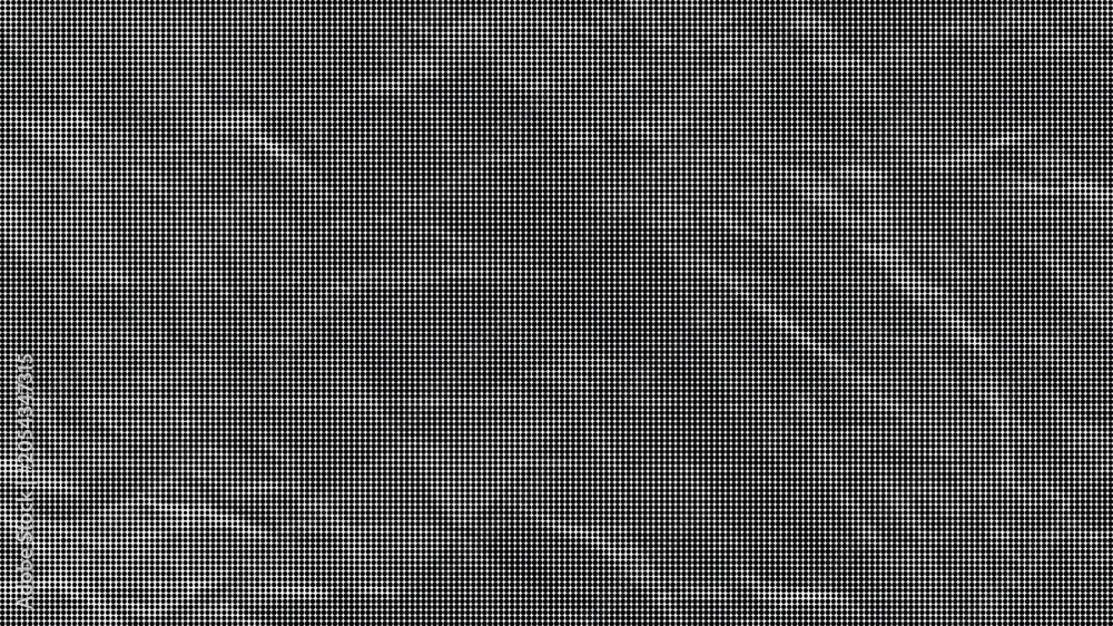 Fototapeta premium A close-up view of a crumpled gray surface with many wrinkles and creases.
