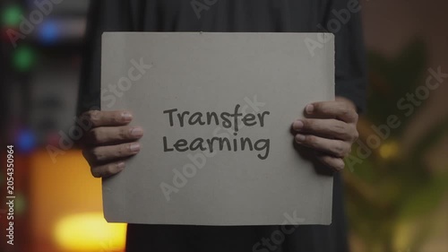 Transfer Learning Written on Banner – Man Holding Placard
