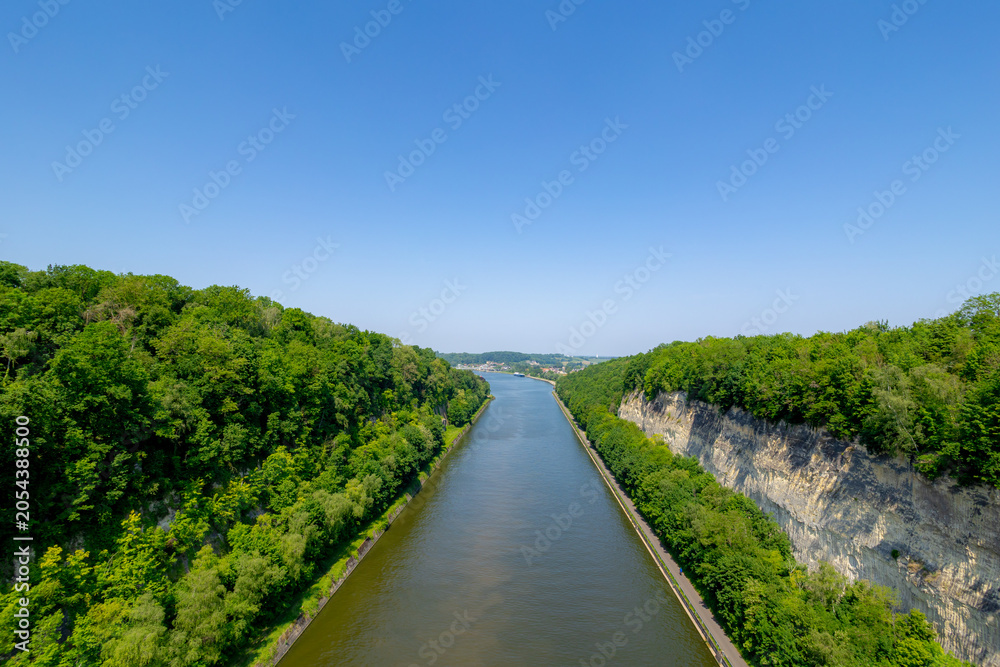 Fototapeta premium The Albert Canal in Lanaye and Kanne villages in Province de Liège, Walloon Region, Belgium, Border between Maastricht, Limburg, Netherlands, Canal connects also the Meuse river with the Scheldt river