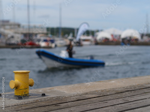 Photography A post for mooring a rope in the port