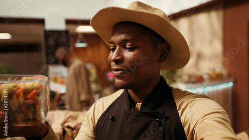 Photography POV of farmer promoting his homegrown produce online, filming video ad to present organic merchandise sold at local supermarket