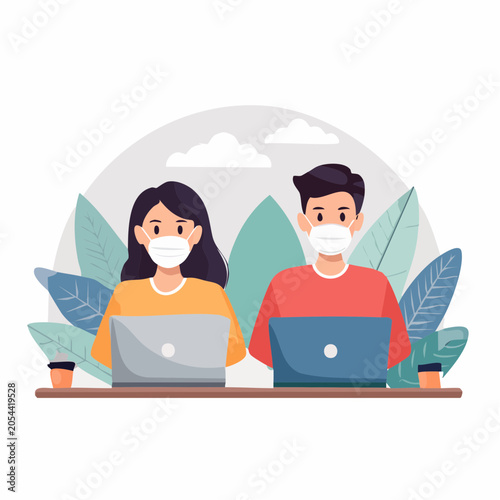 People wearing face masks working on laptops