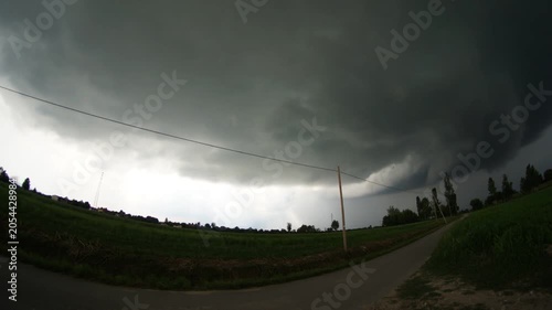 Supercell Storm Formation and Dark Clouds Passing Overhead Timelapse In Northern Italy Before Extreme Haze Events Tornado