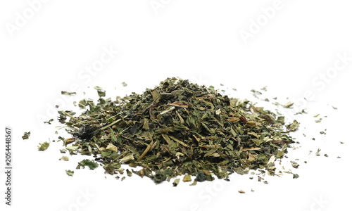 Photography Dry, cut and sliced nettle pile, isolated on white background