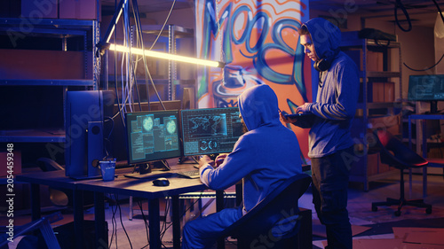 Bild auf Leinwand Spies in secret hideout trying to steal valuable data by hacking governmental websites but getting their attacks rejected by strong security, seeing access denied error message on screen
