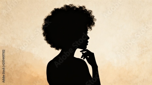 Silhouette of a woman with afro hair