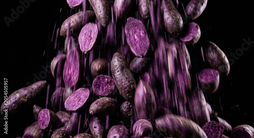 Ube yam tubers falling with motion blur effect