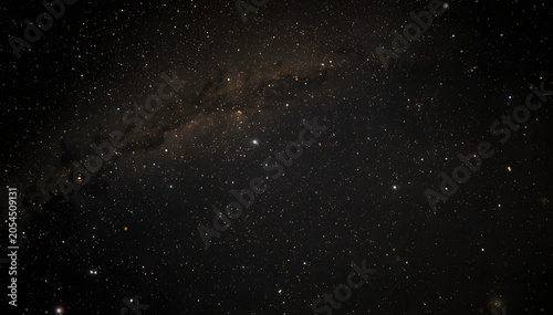 Moody Starfield Background with Gold and White Stars and Nebula