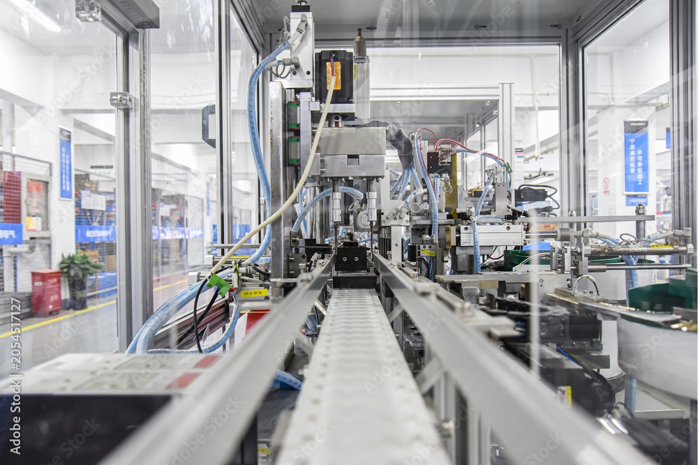Fototapeta premium Automated Production Line Machinery in Modern Factory