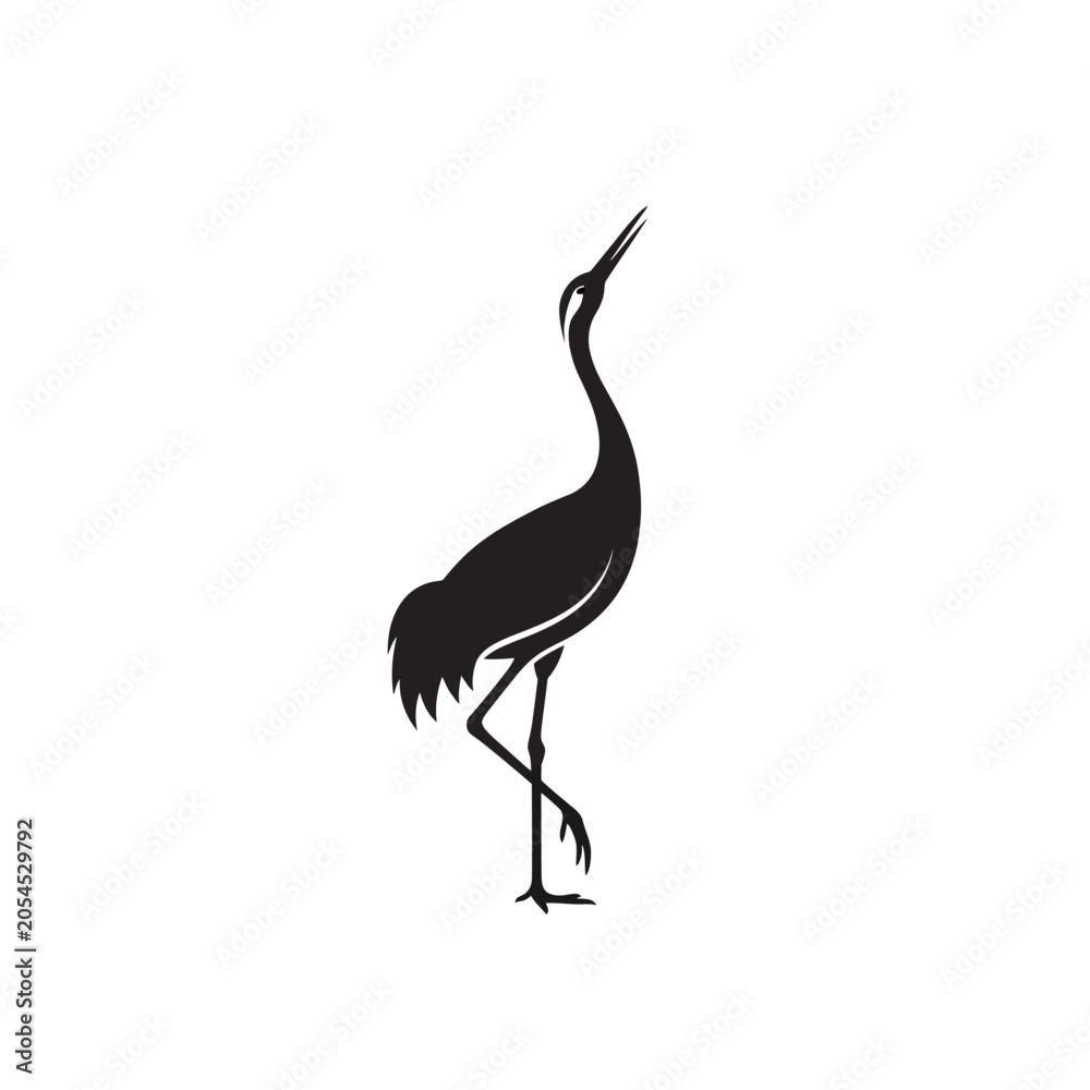 Fototapeta premium A minimalist black silhouette of a crane standing on one leg.