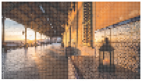 Fotografie Aerial view of city buildings and streets with cars and trees in urban area