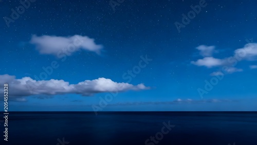Night sky over calm ocean