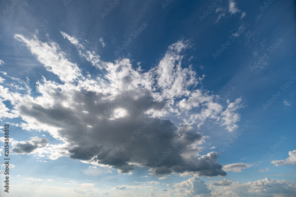Fototapeta premium Dramatic cumulus cloud formation over bright blue sky