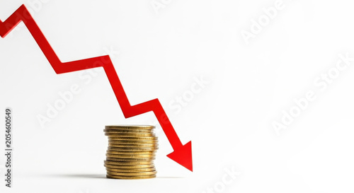 Red downward arrow on stack of gold coins signifying financial loss and market decline on white background.