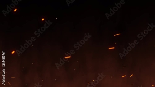 Real bonfire background glowing fire flakes blowing wind hot sparks smoke particles motion graphic for cinematic fire overlay and atmospheric video.