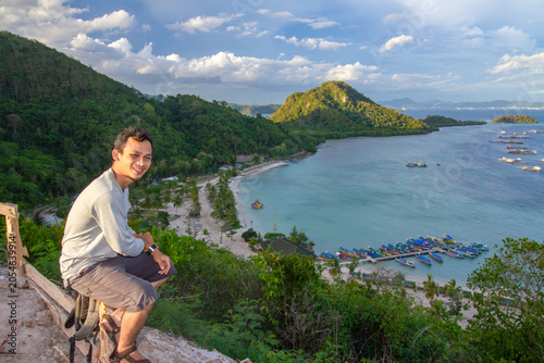 Obraz na plátně Tourist Enjoying Coastal View at Sari Ringgung Lampung Indonesia