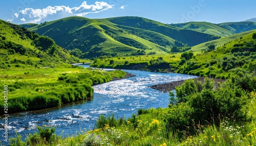 River flowing through green mountain landscape.